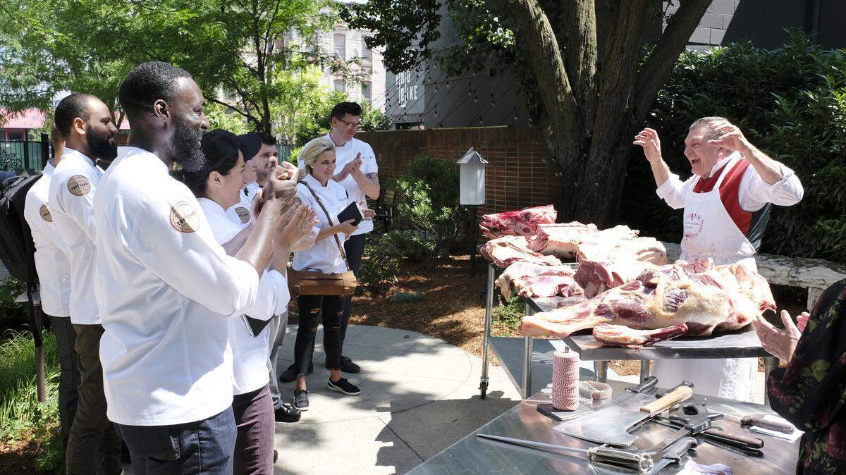 “Carne!” In episode seven on “Top Chef” Kentucky the chefs, including from left Justin Sutherland, Eric Adjepong, Michelle Minori, Kelsey Barnard and Brian Young get a visit from Italian butcher and meat expert Dario Cecchini.