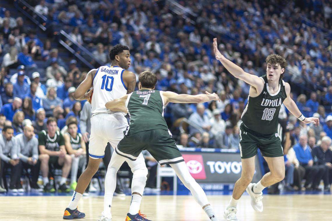 Kentucky basketball forward Brandon Garrison (10) looks to pass the ball as Loyola (Maryland) forward Jonas Sirtautas (7) defends during their game at Rupp Arena on Nov. 21.