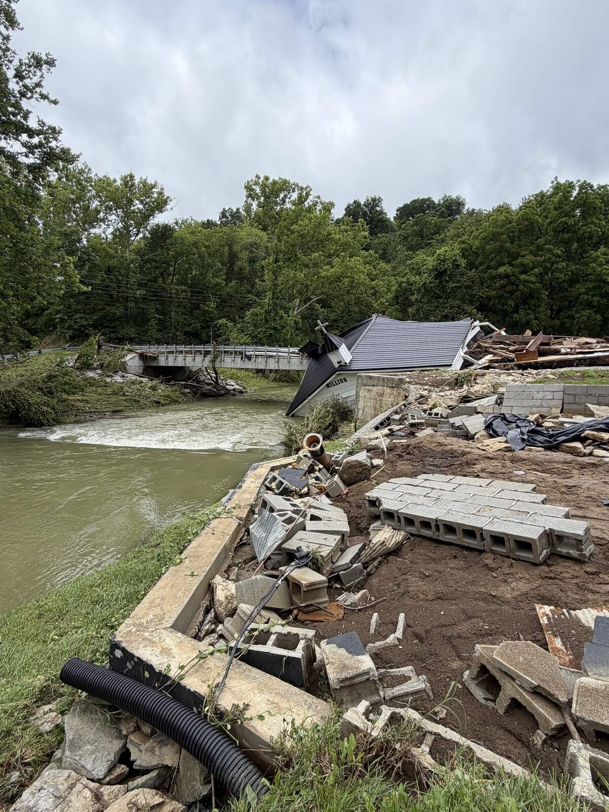 Million Church on Tates Creek in Madison County was ripped off the foundation and crashed into a bridge.