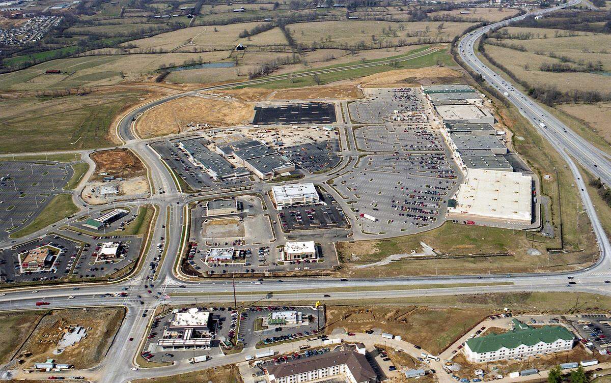Aerial view of the Hamburg Pavilion shopping center at the intersection of Man o’ War Boulevard, running left to right across the bottom of the image, and I-75, seen at right, Feb. 15, 1999. Target is in the lower right corner of the shopping center. Restaurants facing Man o’ War from left, Max & Erma’s (today Red Lobster), Applebee’s (Chuy’s), TGI Fridays (The Local Taco) and Don Pablo’s (Old Chicago). Sir Barton Way, curving up the middle of the image is under construction and not complete.