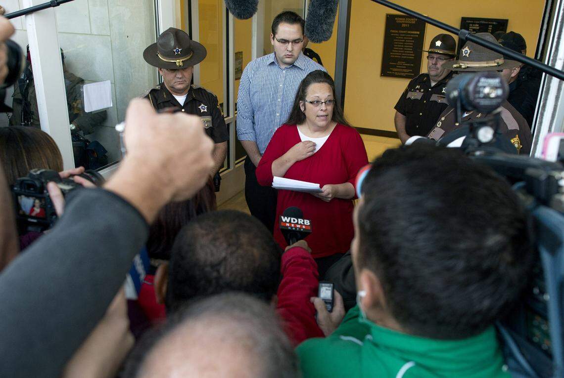 MOREHEAD, KY - SEPTEMBER 14: Rowan County clerk Kim Davis gives a statement about her intentions on applying her signature to same sex marriage licenses on her first day back to work, after being released from jail last week, at the Rowan County Courthouse September 14, 2015 in Morehead, Kentucky. Davis was jailed for disobeying a judges order for denying marriage licenses to gay couples on the basis of her religious faith. (Photo by Ty Wright/Getty Images)