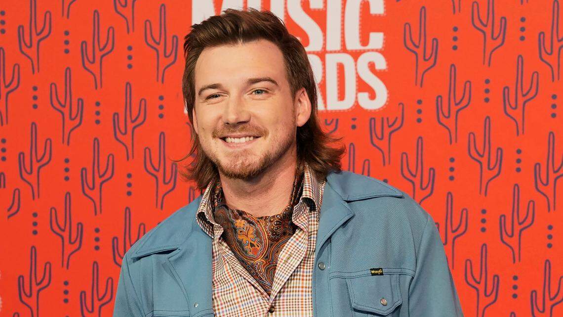FILE - In this June 5, 2019, file photo, Morgan Wallen arrives at the CMT Music Awards in Nashville, Tenn. Wallen has been dropped from performing on “Saturday Night Live” after breaking the show’s COVID-19 protocols. The country singer posted a two-plus minute video on social media Wednesday, Oct. 7, 2020, about the show’s decision. He apologized after he was shown on TikTok socializing mask less at a crowded bar and house party this past weekend in Alabama. (AP Photo/Sanford Myers, File)