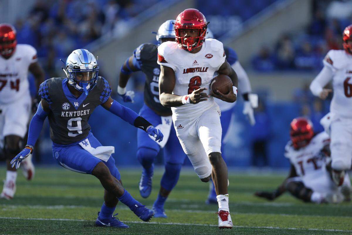 Louisville quarterback Lamar Jackson (8) directed the Cardinals to points on all eight drives he engineered as U of L blasted Kentucky 44-17 in the 2017 Governor’s Cup rivalry game.
