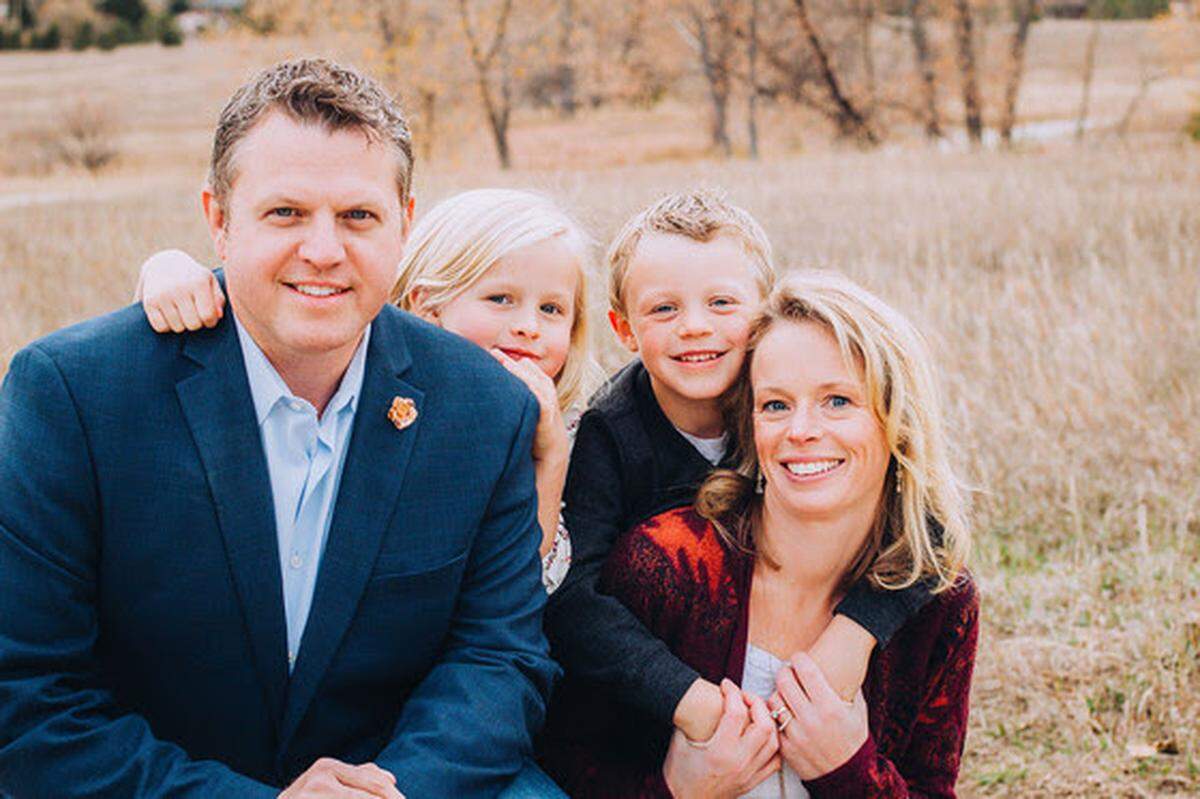 New Kentucky Education Commissioner Jason Glass, his daughter Norah, 8, son Chase ,7, and wife Sarah