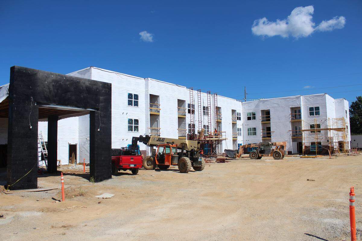 Construction is ongoing at Wellington Park Apartments, an affordable housing complex opening in 2026.