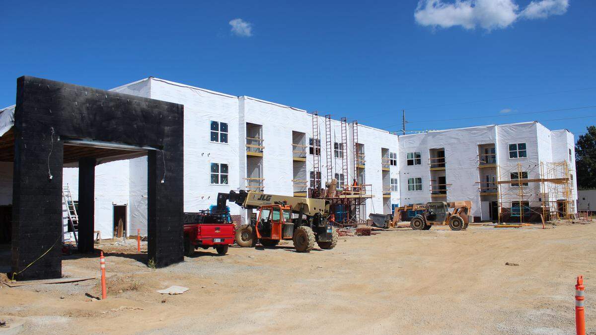 Construction is ongoing at Wellington Park Apartments, an affordable housing complex opening in 2026.
