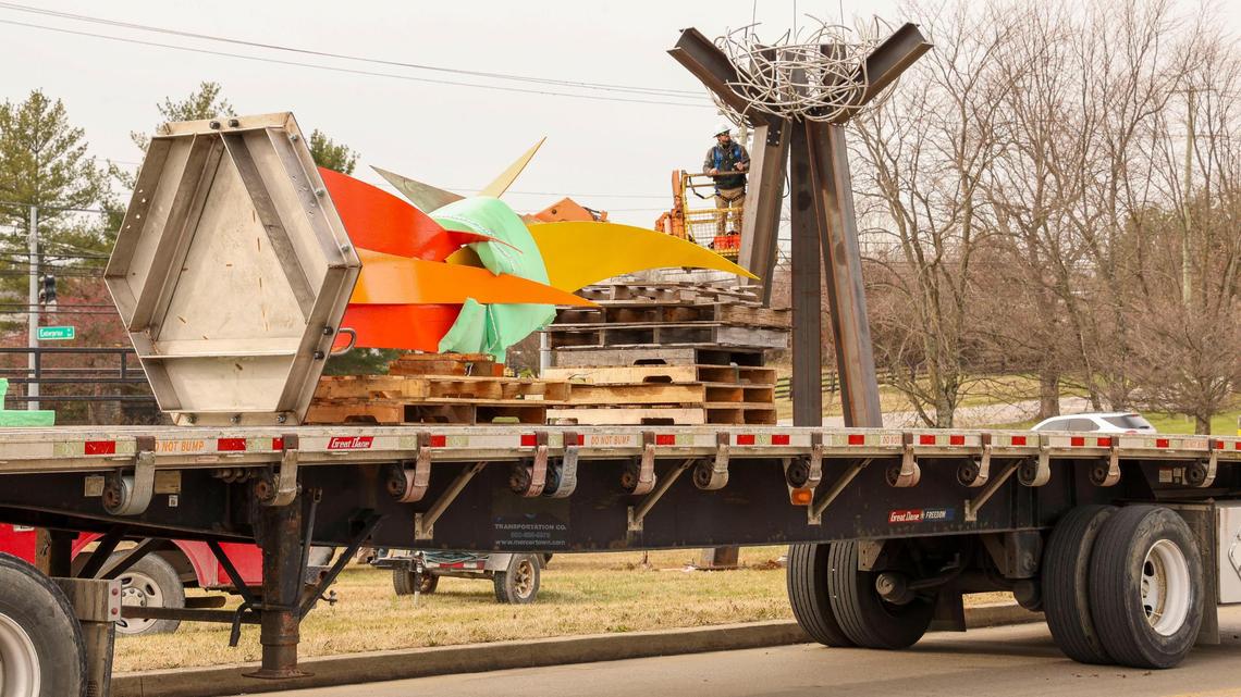 Installers work on placing a new sculpture, “The Birth of Hope,” on the front lawn of the Fayette County Detention Center, Friday, Dec. 13, 2024 in Lexington, Ky. The sculpture, created by Louisville artist Dave Caudill, is a tribute to the spirit of the public servants who work at the facility, Lexington Mayor Linda Gorton said. The sculpture is located in the Old Frankfort Pike corridor, which serves the detention center, local businesses and tourists who travel down Old Frankfort Pike, a National Scenic Byway.