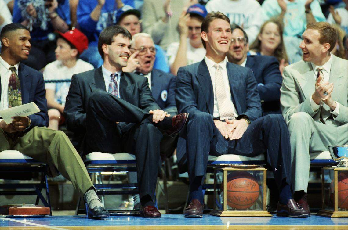 University of Kentucky basketball players Sean Woods, left, Richie Farmer, Deron Feldhaus and John Pelphrey in Rupp Arena on the night, April 7, 1992, when their jerseys were retired in a surprise announcement by then-UK AD C.M. Newton.