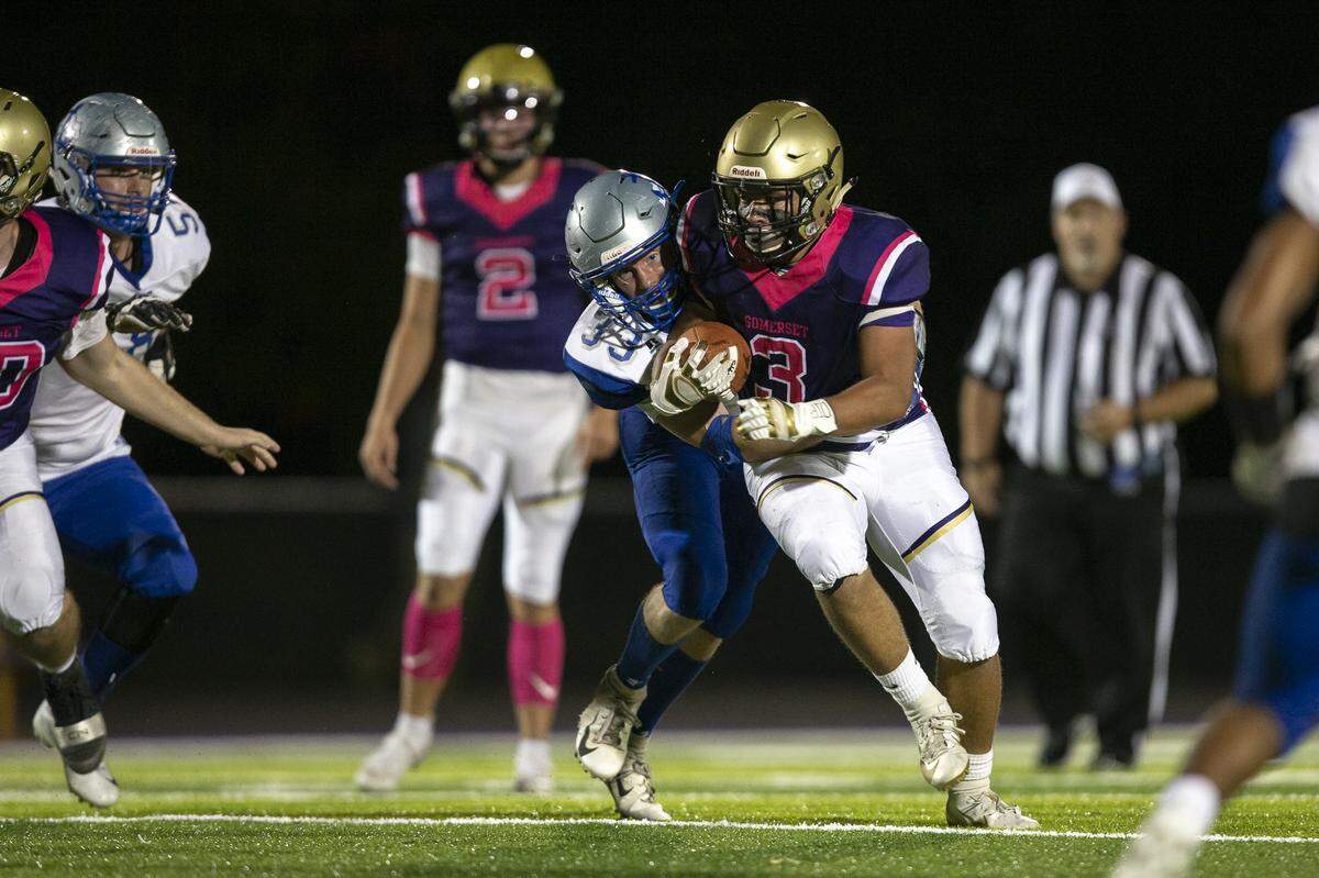 Somerset’s Cam Austin runs the ball during a game against Danville.