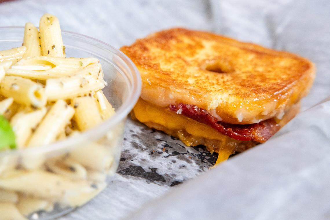 The Sinker is a glazed doughnut filled with Cheddar Cheese and bacon. Pair with tomato soup and that could be breakfast or lunch.