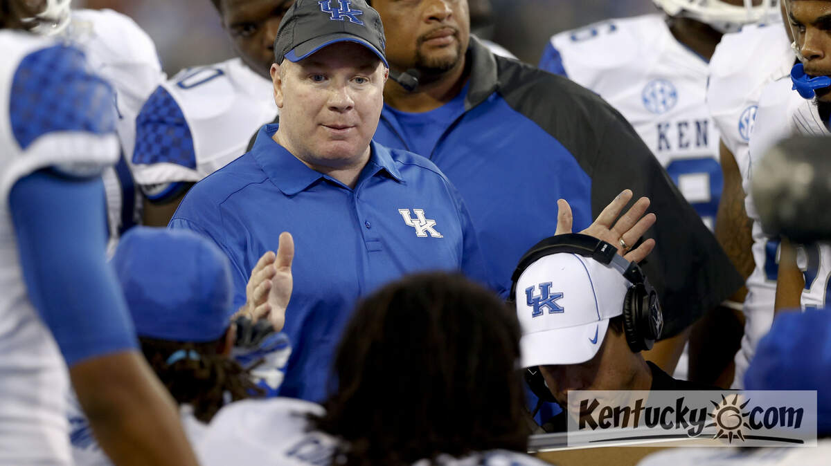 UK coach Mark Stoops talked to his defense as   UK played WKU at LP Field on Saturday August 31, 2013 in Nashville, Tenn. Photos by Mark Cornelison | Staff