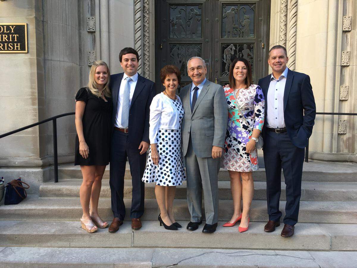 Ohio State Coach Chris Holtmann, right, will face Kentucky on Saturday in Las Vegas. Holtmann’s family, from left to right: Younger brother John Michael with wife Brittany, mother Patty and father John, Holtmann with his wife Lori.