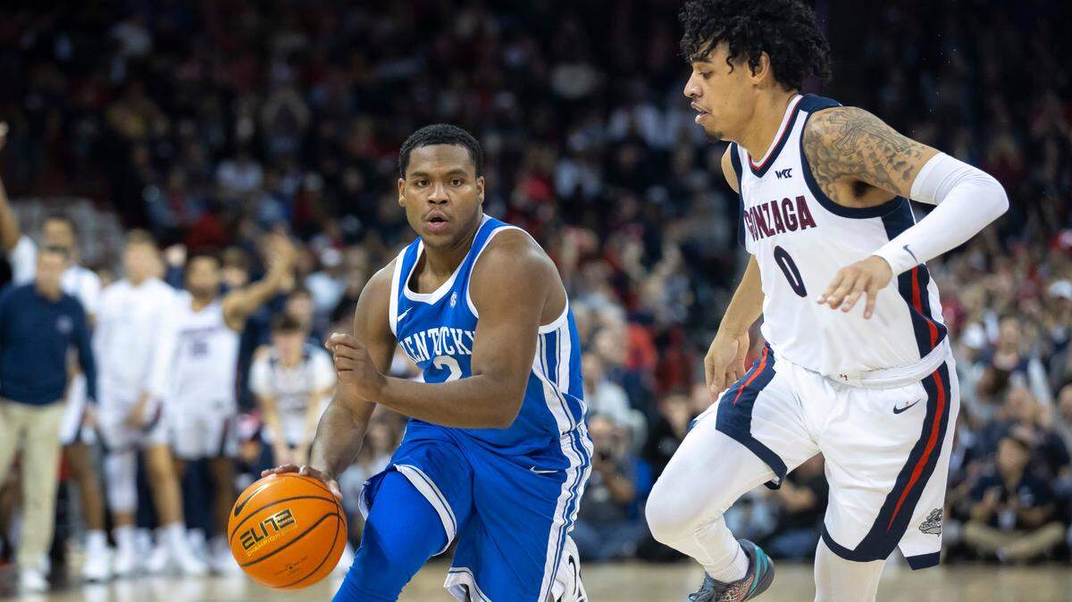 Kentucky’s Sahvir Wheeler (2) drives against Gonzaga’s Julian Strawther (0) during Sunday night’s game in Spokane, Wash. The loss dropped UK to 3-2 on the season.