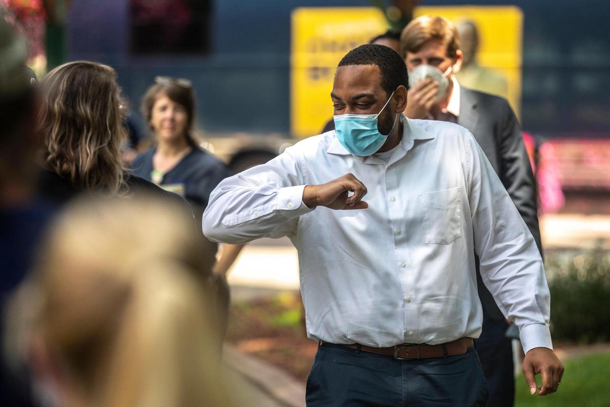 U.S. Senate candidate Charles Booker greets supporters at campaign stop in Pikeville, Ky., on Monday, June 22, 2020.