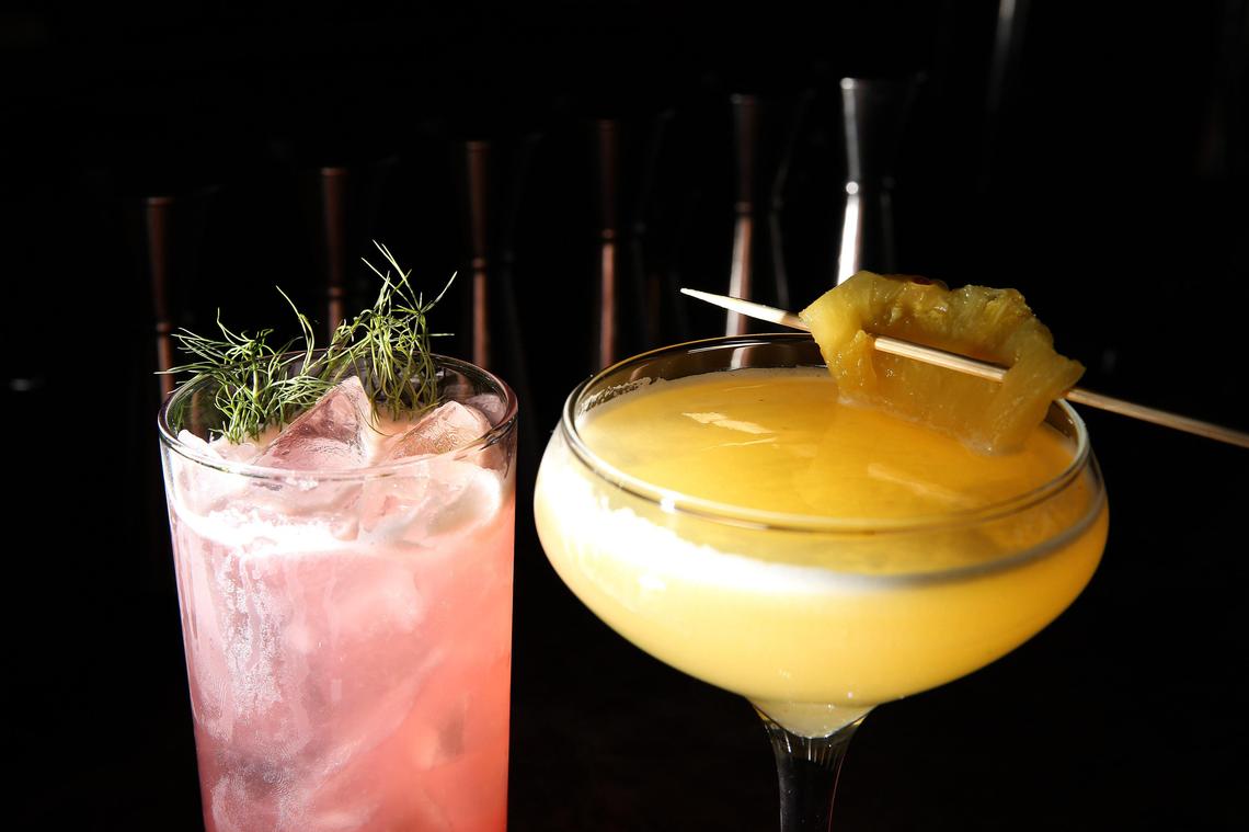 “Earth, Wind and Fennel” cocktail, left, with a “Don’t Tiki to Me or My Son Ever Again” at County Club.