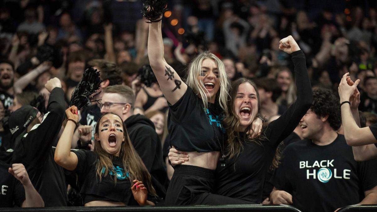 The student section from North Oldham High School cheers its team to victory in the first round of the Boys’ Sweet 16 in Rupp Arena on Wednesday.