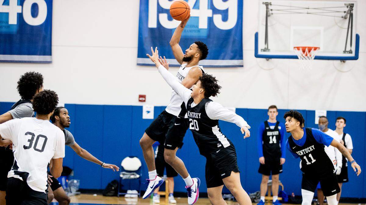 ‘What if it were your son?’ College basketball suffers — and adjusts — in pandemic.