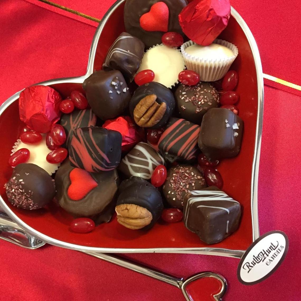 Ruth Hunt Candies has a variety of chocolates and bourbon balls available in heart shaped boxes.