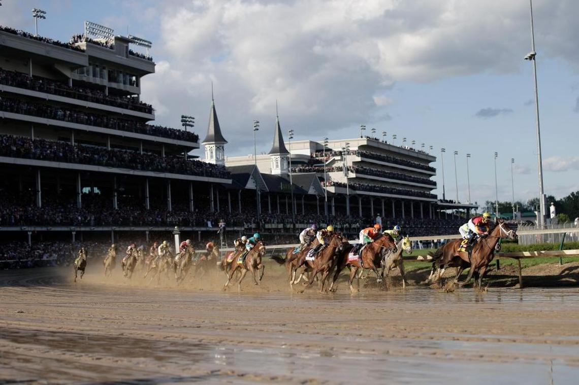 The horses come around the first turn in the 143rd Kentucky Derby on May 6, 2017 at Church Hill Downs in Louisville.