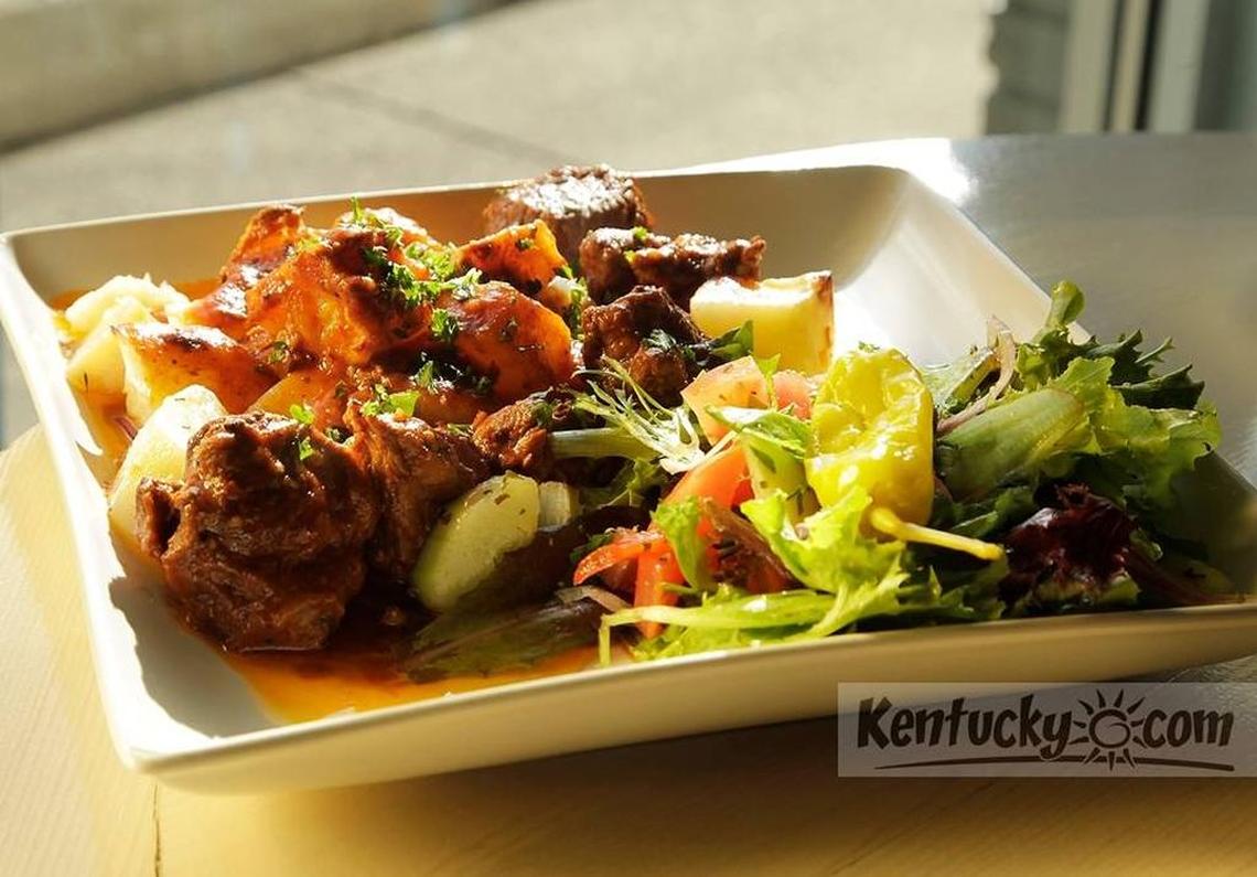 Greek beef stew is one entree option that the new downtown Athenian Grill will have in its grab-and-go section for customers who want to take lunch or dinner home. The restaurant is expected to open in March.