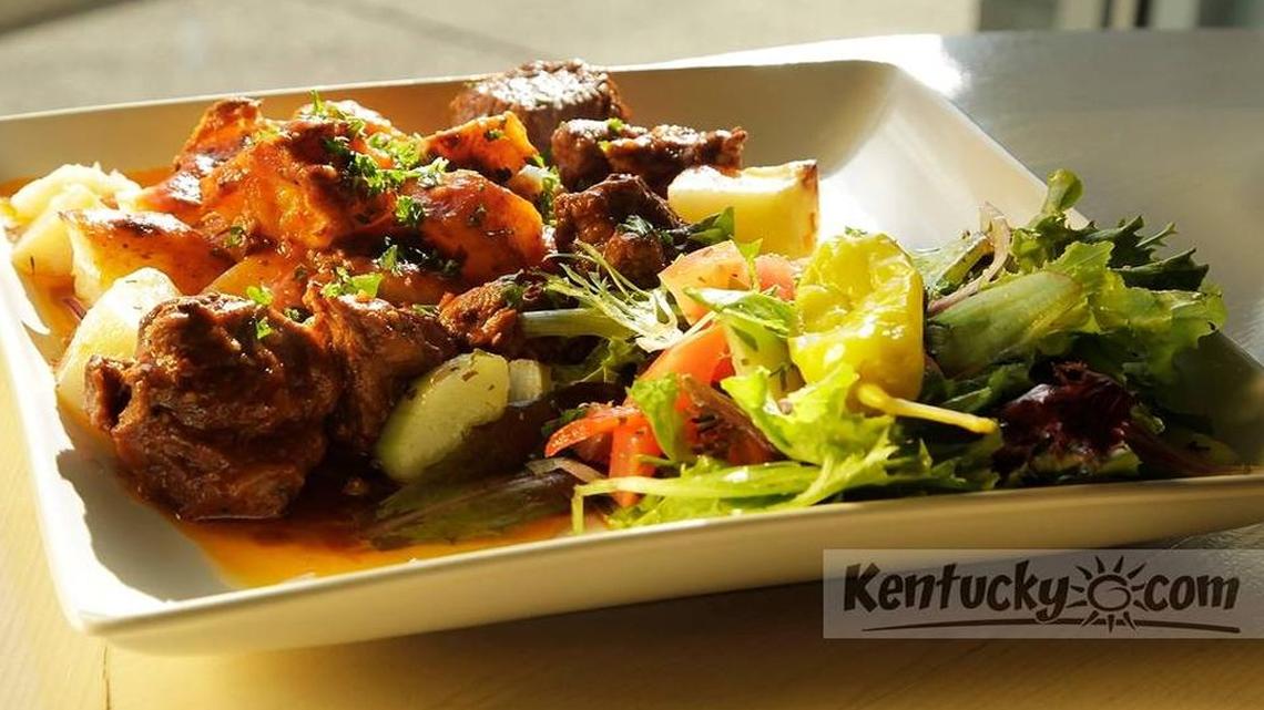 Greek beef stew is one entree option that the new downtown Athenian Grill will have in its grab-and-go section for customers who want to take lunch or dinner home. The restaurant is expected to open in March.