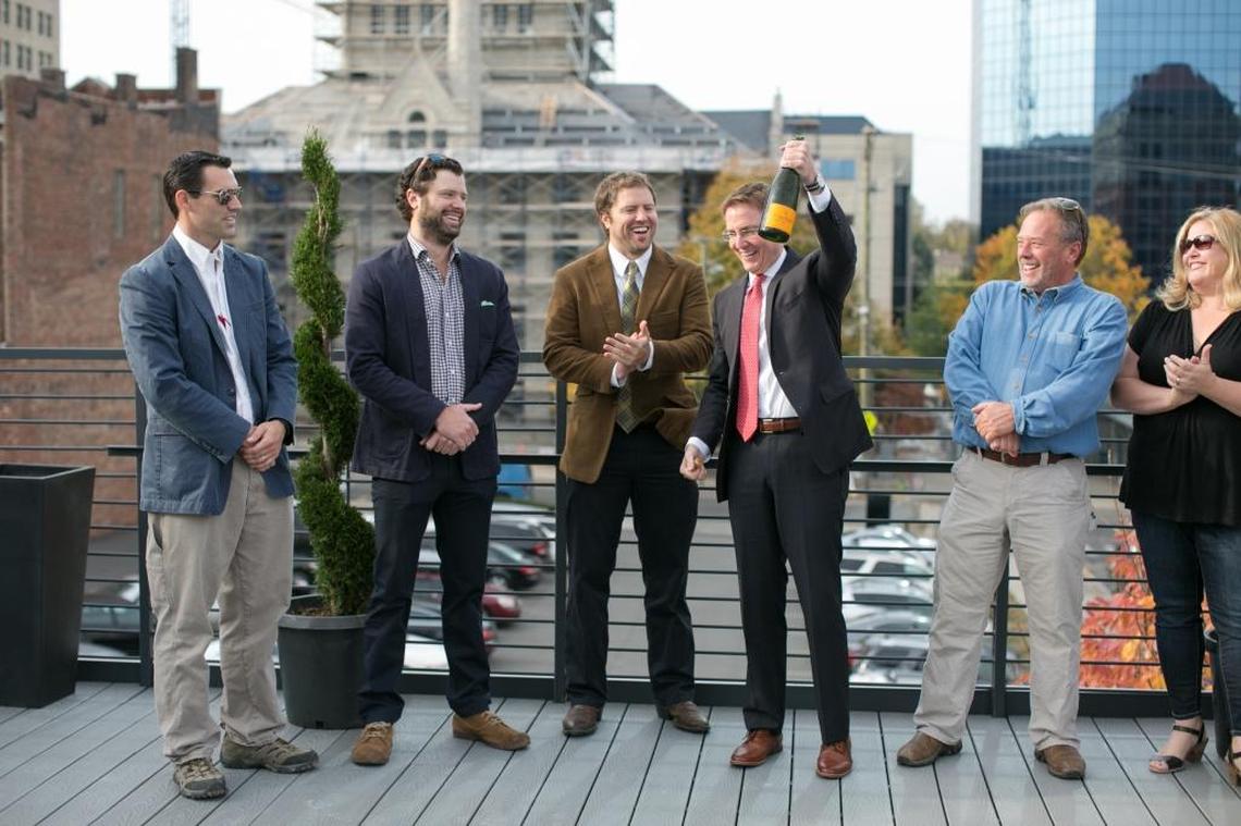 Lexington Mayor Jim Gray helped to christen the new rooftop bar at Belle’s Cocktail House on Market Street in 2016. From left, co-owners Bobby Eidson, Justin Thompson, Seth Thompson, with Gray, co-owner Larry Redmon and architect Rebecca Burnworth.