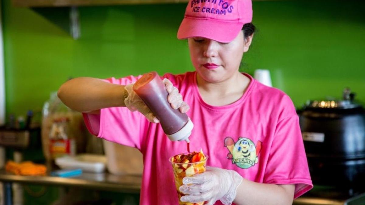The Mangonada, with mango ice cream and mango chunks, is topped with a sweet and sour sauce and chili powder. It’s the best-selling item at Panchito’s Ice Cream.