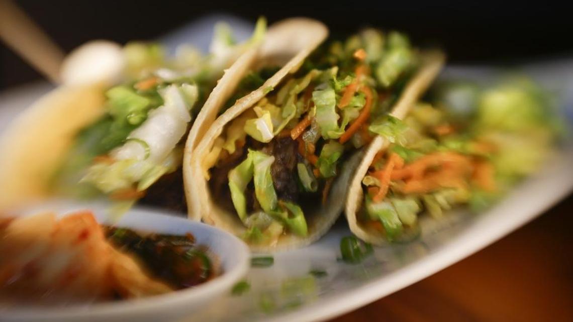 Korean tacos are a standout at Buddha Lounge, braised short rib served in a corn tortilla and served with Kim chi.