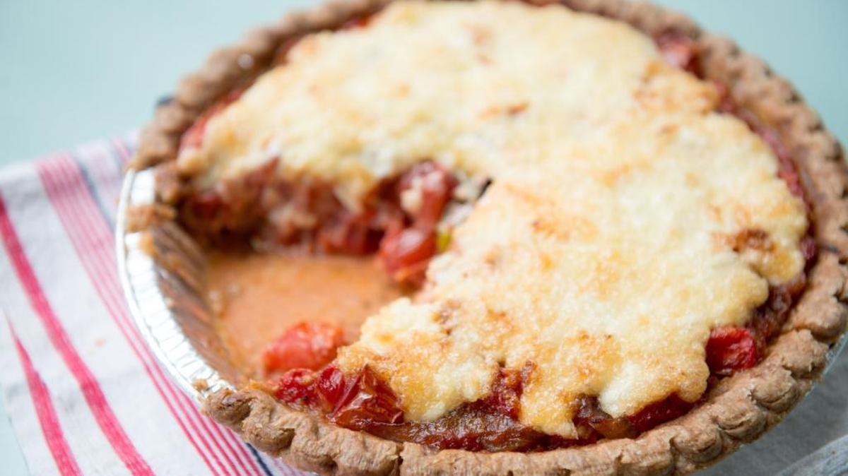 Vivian Howard said this tomato pie is the biggest summer seller at her North Carolina restaurant, Chef and the Farmer. She suggests using two different colors of tomatoes, one for the roasted portion and another for the fresh, for a nice visual touch.