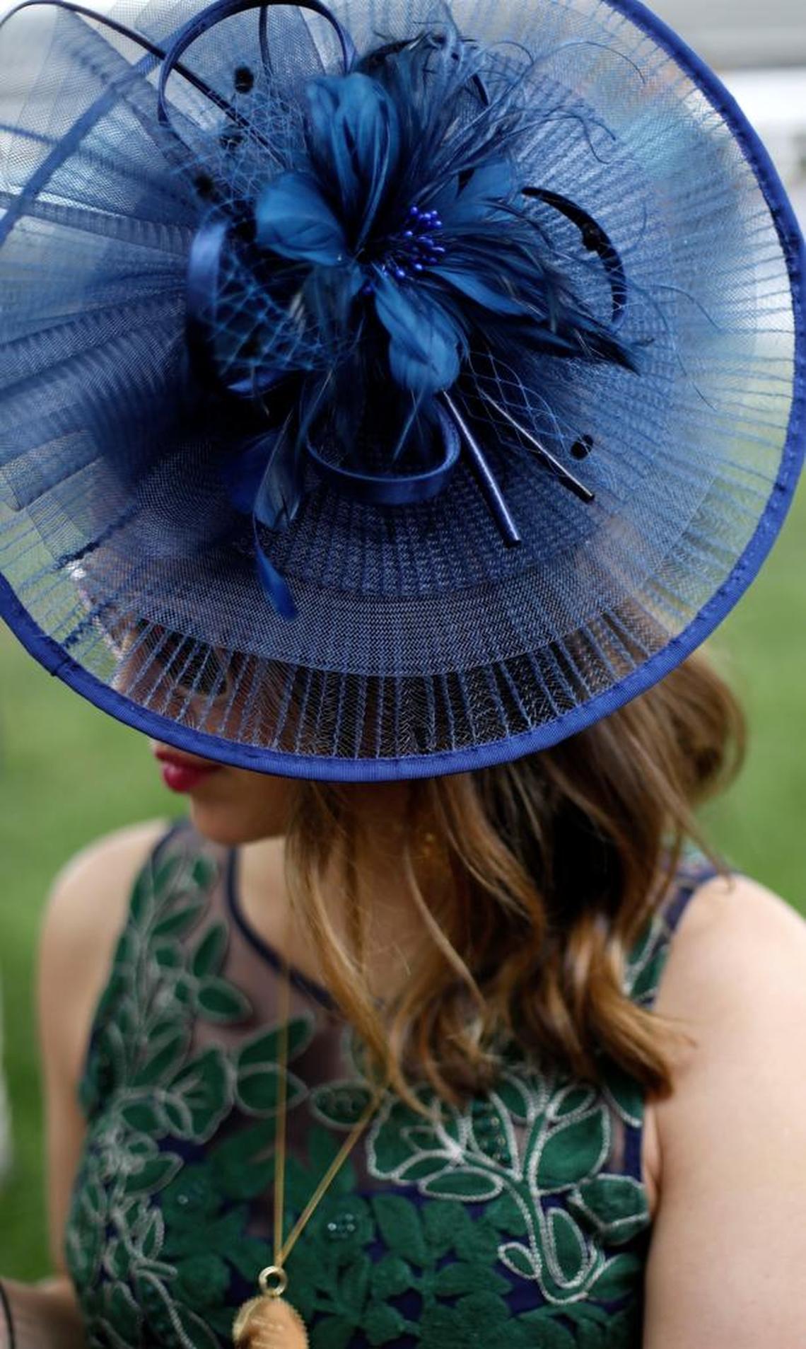 Maria Baer, Indianapolis, wears a blue fascinator at Churchill Downs Saturday, May 6, 2017 in Louisville, Ky.