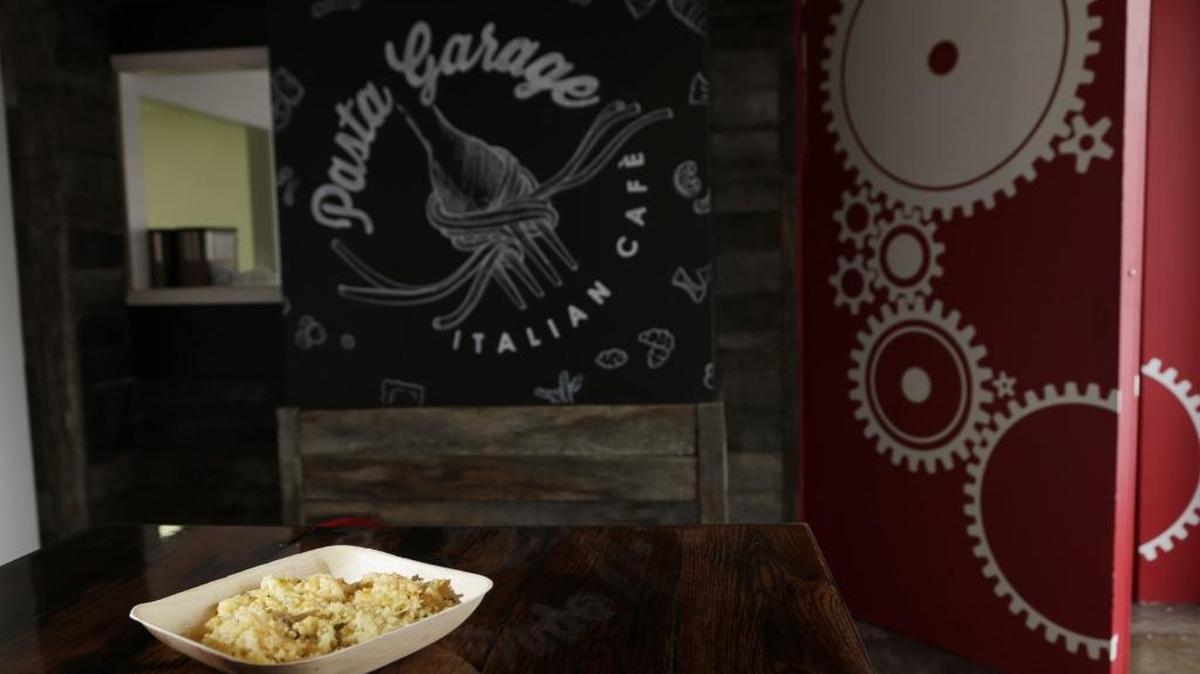 The mac and cheese at Pasta Garage is a quite nice blend of pasta and smoked Gouda with little chunks of prosciutto livening up the mixture.