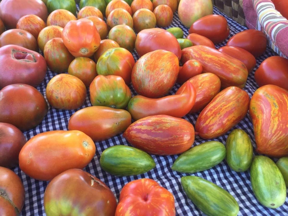 Local farmers markets offer seasonal fresh vegetables and fruits, including heirloom varieties of tomatoes.