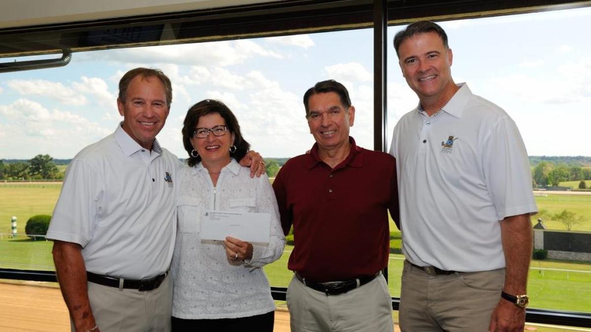 Doug Flynn (left to right), Jennifer Mynear and Doug Mynear of Jarret's Joy Cart, and Matthew Mitchell attended a reception marking the official start of a week-long schedule of events for the Children’s Charity of the Bluegrass, culminating with the Children’s Charity Classic golf tournament June 23-24 at Griffin Gate Golf Club and Greenbrier Golf & Country Club.