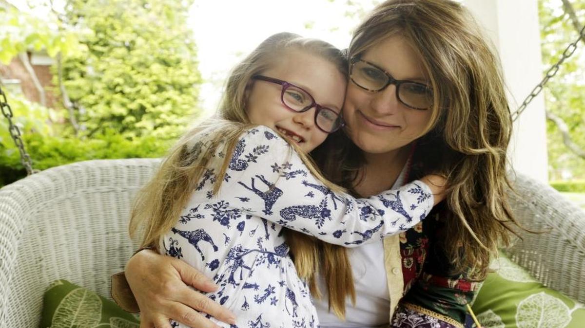 Kellee Edwards and daughter, Kate Whitllock, age 6, at their home in Lexington. Kate will be attending Camp Kesem in Versailles, a week-long camp for children with parents who have cancer.
