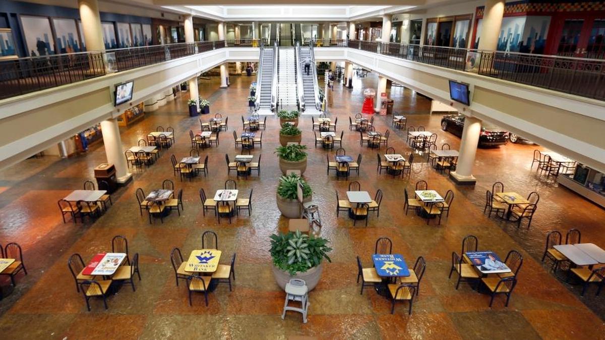 The nearly deserted eating area during lunch time in the food court at the Shops at Lexington Center in Lexington on January 24.