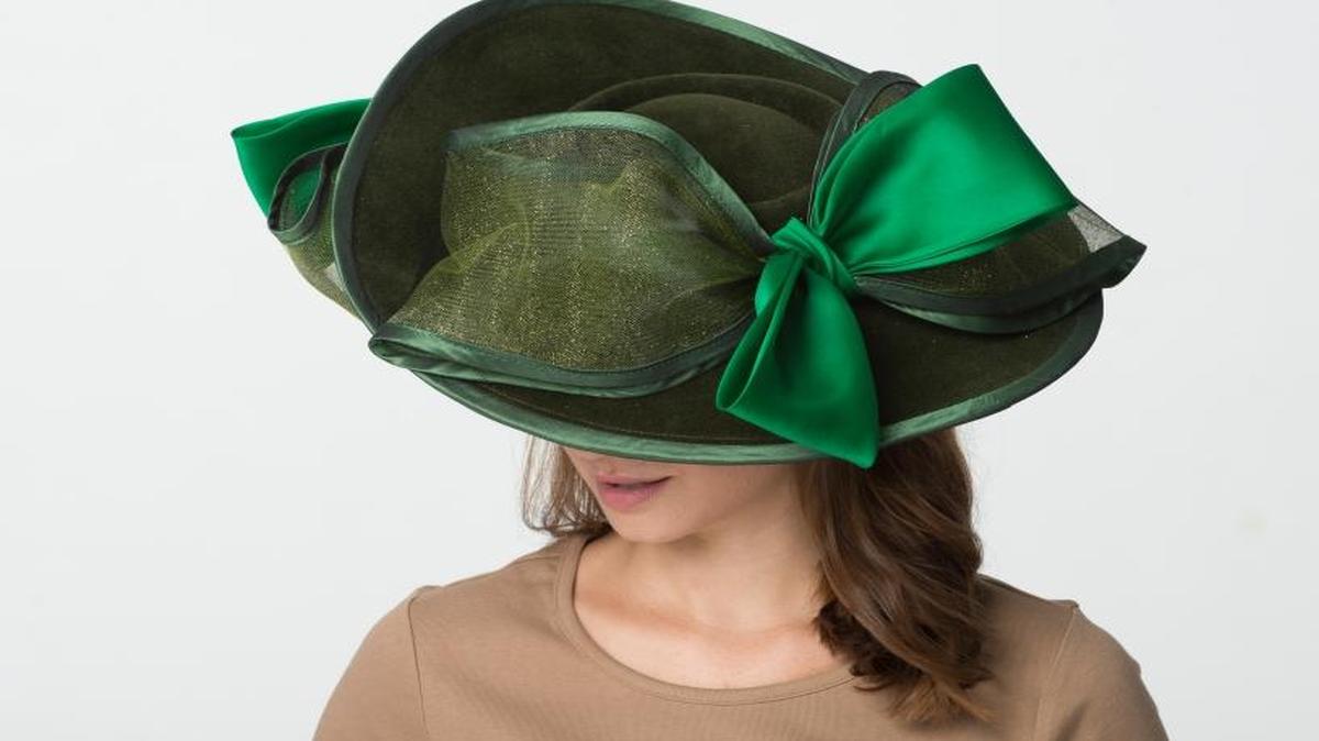 Make an entrance at Keeneland in this velour felt hat with silk, horsehair and sparkle tulle trim accented with a silk taffeta binding. By Christine A. Moore Millinery, $598.