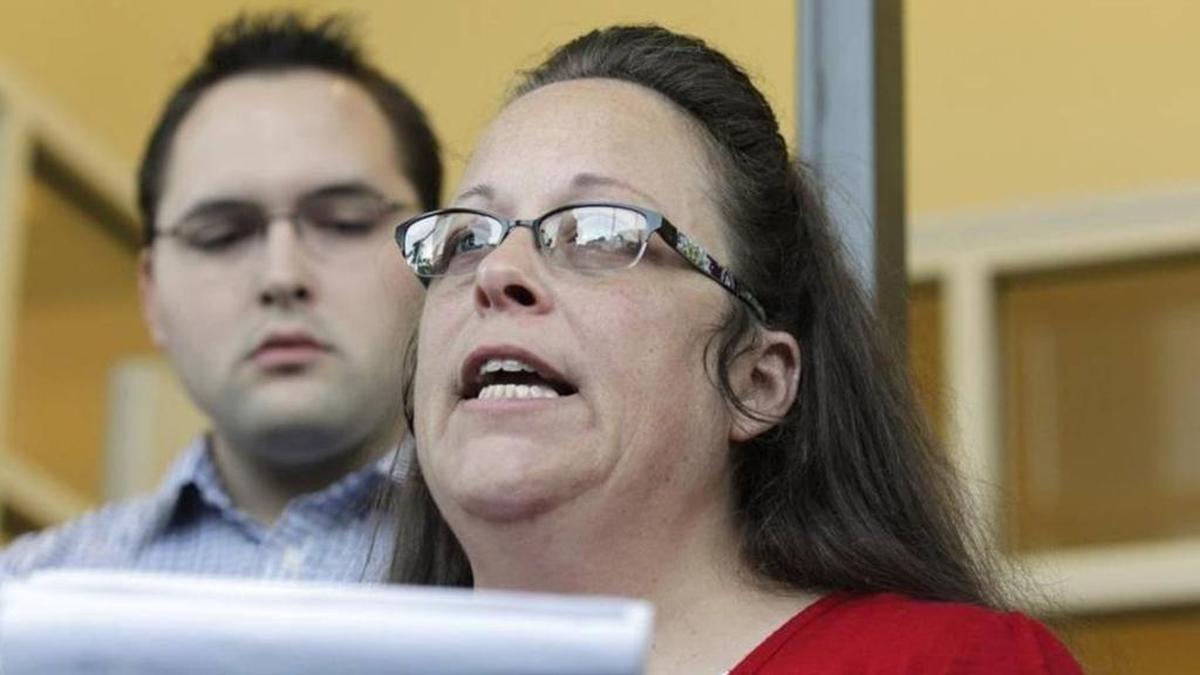 Rowan County Clerk Kim Davis with her son Nathan, a deputy clerk, in 2015 outside the Rowan County Courthouse.