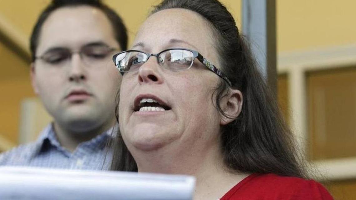 Rowan County Clerk Kim Davis with her son Nathan, a deputy clerk, in 2015 outside the Rowan County Courthouse.
