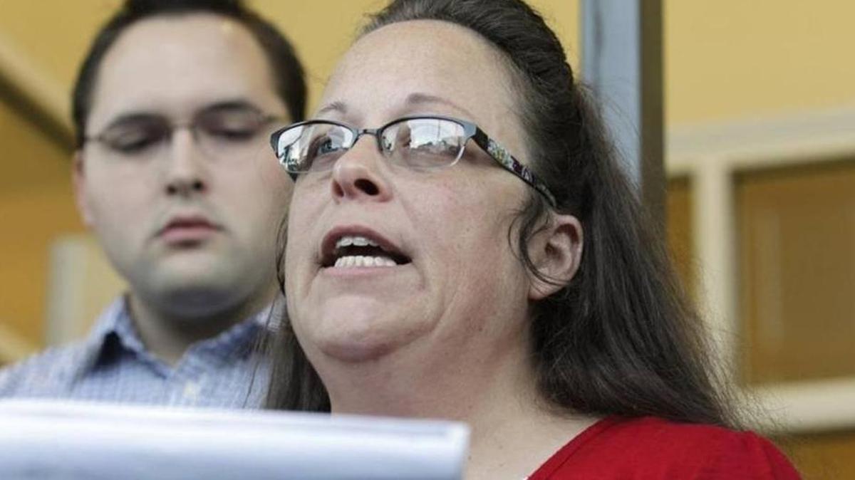 Rowan County Clerk Kim Davis with her son Nathan, a deputy clerk, in 2015 outside the Rowan County Courthouse.