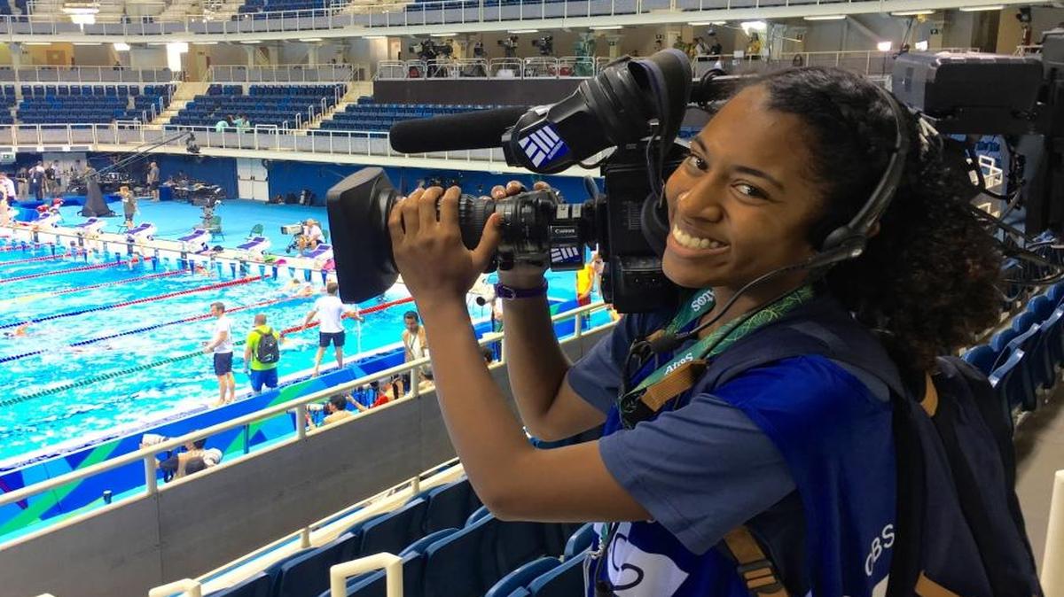 Asbury University graduate Julia Chin takes in a swimming venue during the 2016 Rio Olympics.