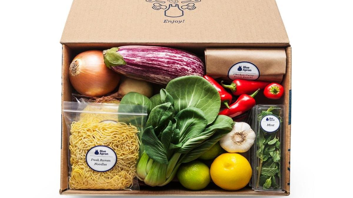 This Blue Apron Box includes ingredients for chicken curry.