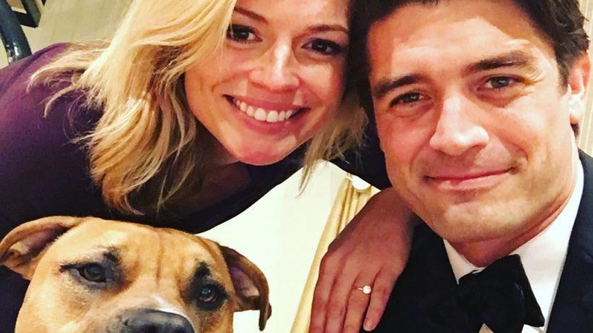 Pamela Brown, her fiance, Adam Wright, and their dog, Bubs.