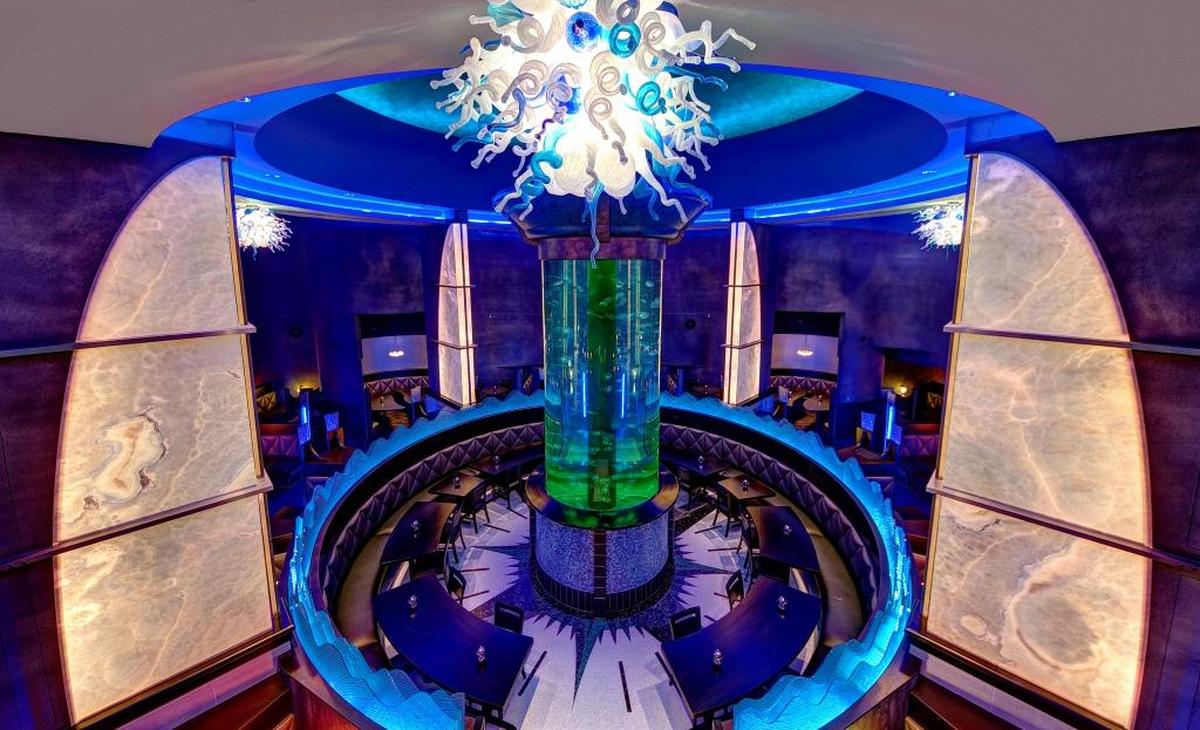 Coba Cocina was known for its towering jellyfish tank and blown glass chandeliers. The column-shaped aquarium, 18 feet tall and six feet in diameter, contained more than 300 jellyfish. The column rose to a gold dome in the center of the restaurant, giving the illusion of sunlight filtering into a cenote.