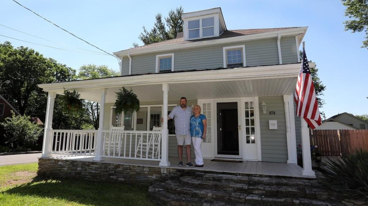 Oscar and Wendy Thornton on the porch of their house at 182 Bassett Avenue, which is part of Sunday’s Kenwick Bungalow Tour.