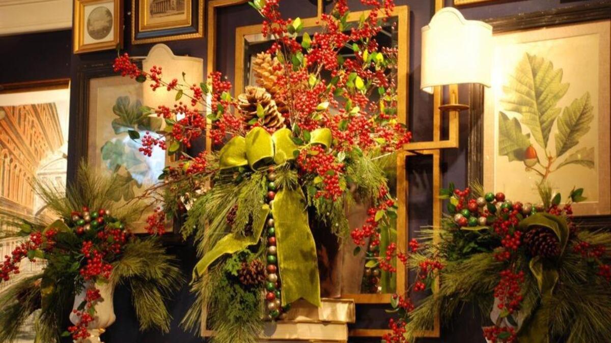 Gorgeous greenery take your displays to the next level, and holiday ribbons give them character and charm.