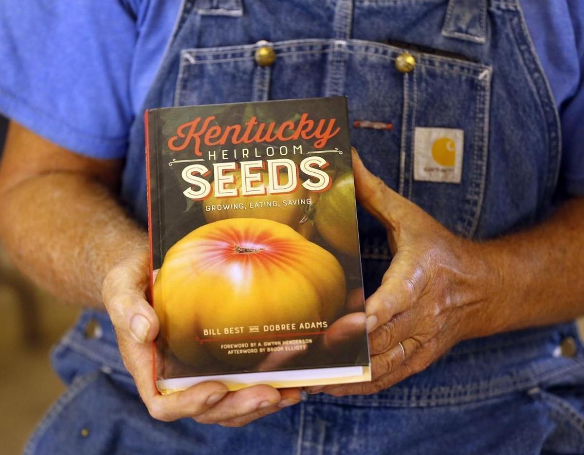 Bill Best showed off his new book, “Kentucky Heirloom Seeds: Growing, Easting and Saving,” at his farm on Pilot Knob Cemetery Road near Berea.
