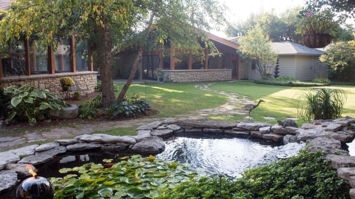 Hidden behind a traditional brick house is a party oasis