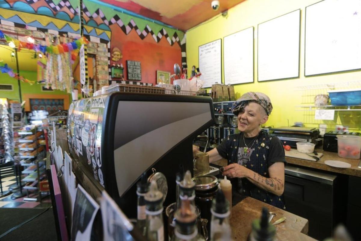 Pat Gerhard made espresso drinks at Third Street Stuff and Coffee in Lexington, Ky, on July 7, 2016. Pat Gerhard works an early shift and creates much of the art at the shop.