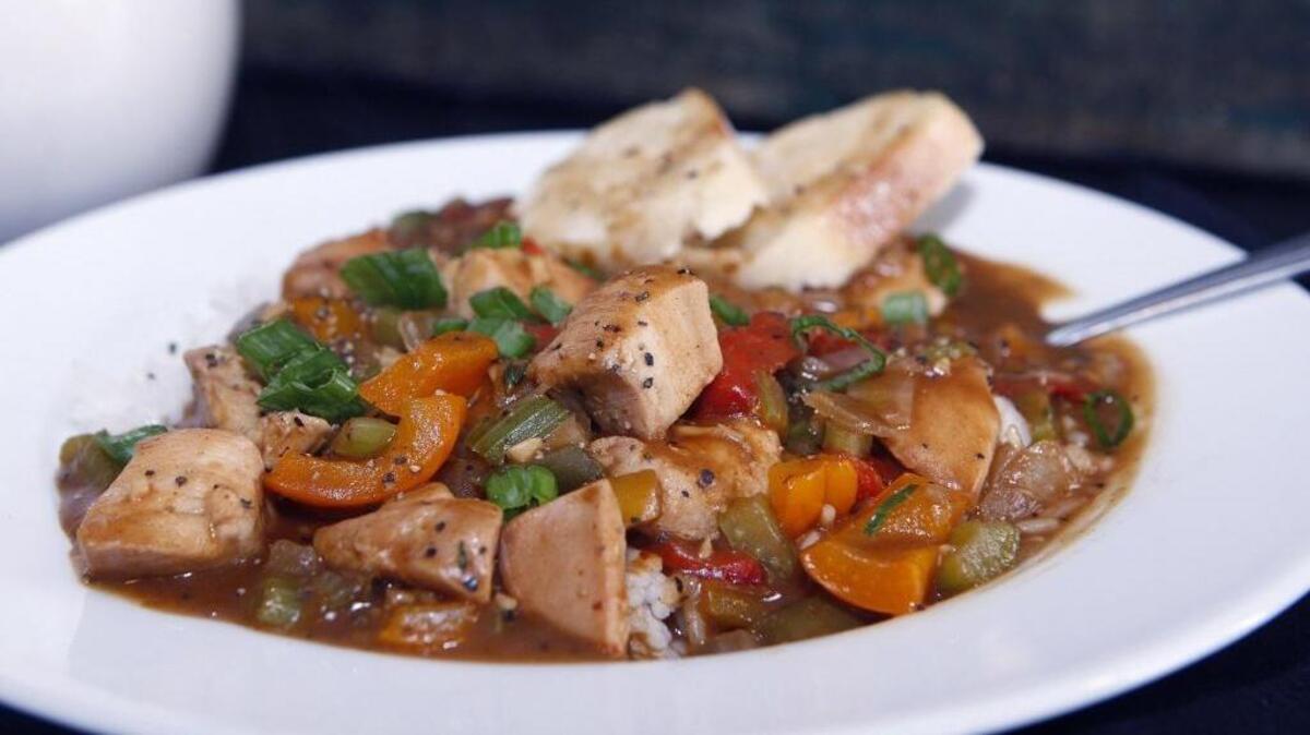 Gumbo, like this version made with chicken, is simple to make and tasty. The flavor comes from the roux; the Creole trinity of chopped onion, celery and peppers; garlic and Creole spices, stock and bay leaves. Serve over rice, with crusty bread.