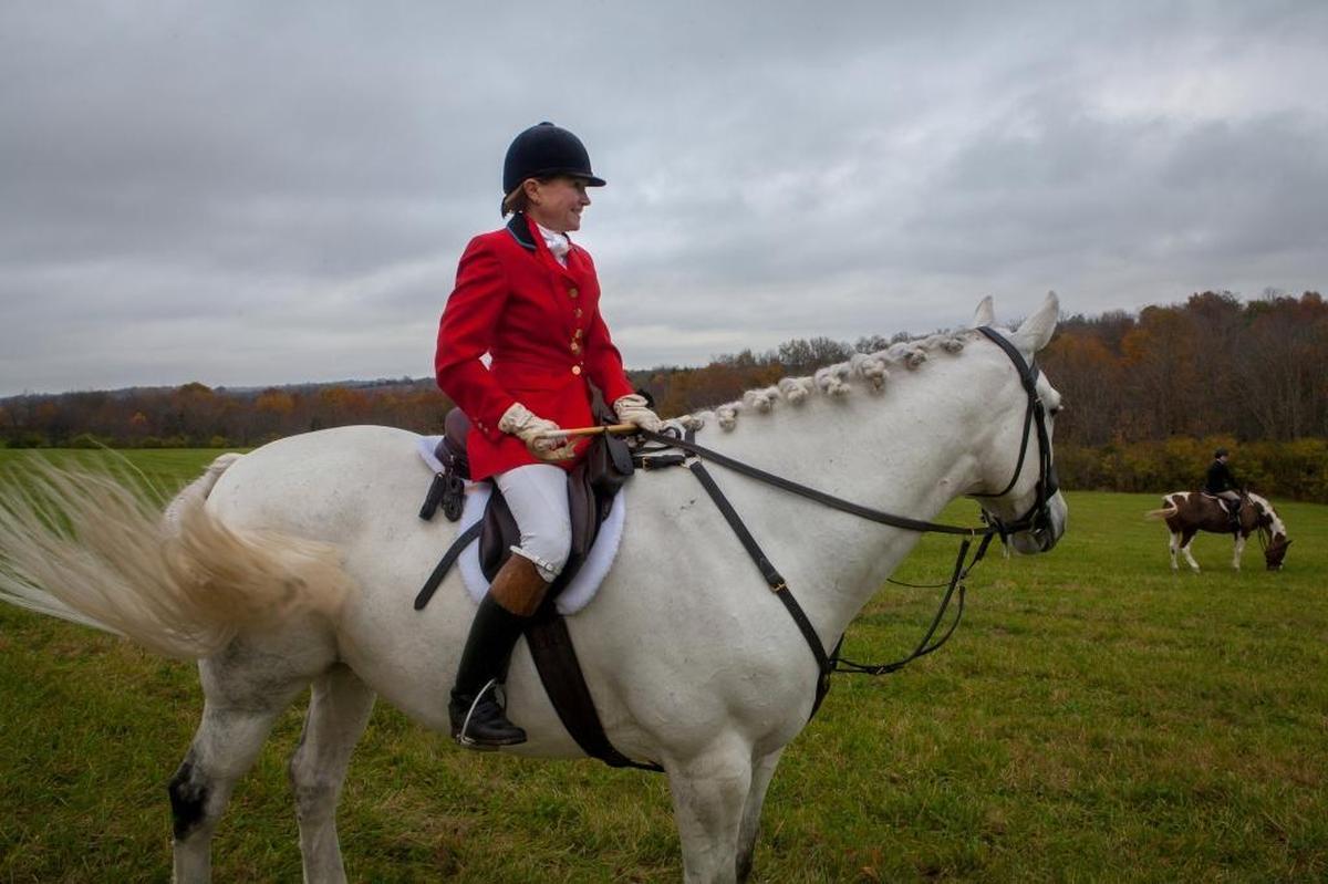 Willa Mason waited to start the first hunt of the season Nov. 4 in nearby farmland after the Blessing of the Hounds at the Iroquois Hunt Club in Lexington.